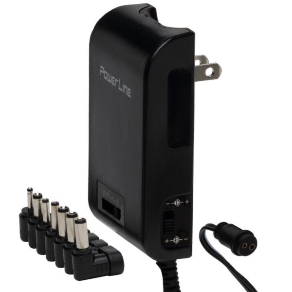 A black power adapter with multiple plugs and a charger.