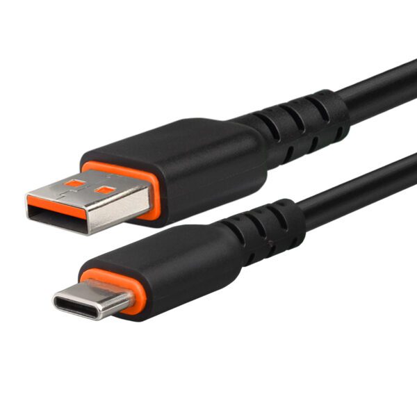 A black and orange cable is connected to the side of a camera.